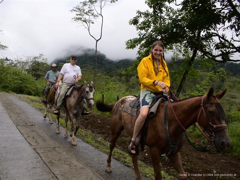 Horseback riding tourists returning from waterfall