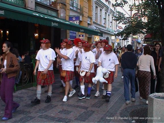 Brits strolling outside shops facing Wenceslas square
