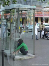 Woman in Telephone booth