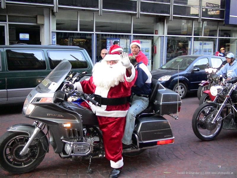 Santa on motorbike in central Toluca