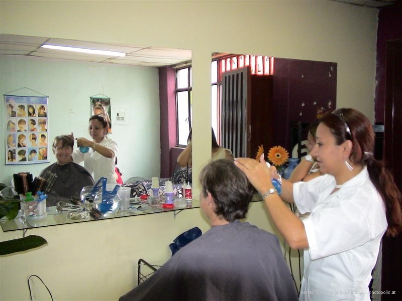 Jan getting a US$1 haircut