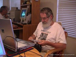 Gerry Chandler working on computer